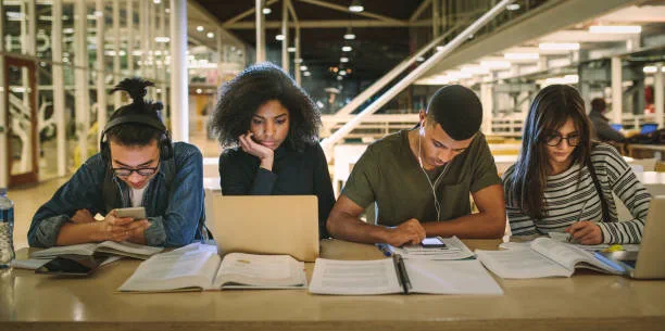 Participants working side by side on the same case